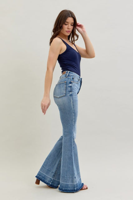 JB High Rise Light Wash Release Hem Flare